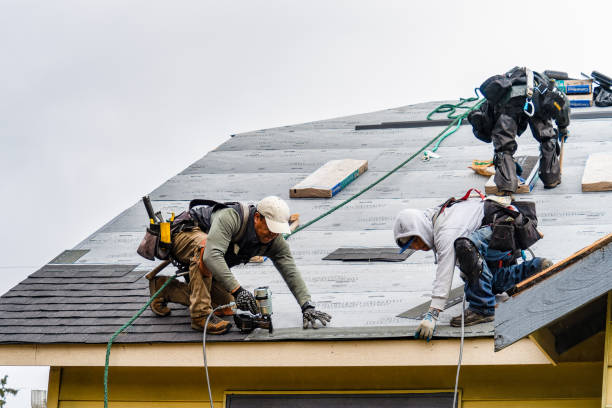 Professional Roofing technician working in Onslow, IA